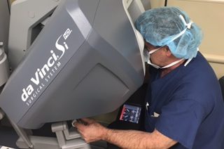 Dr. Reiner with da Vinci surgical system