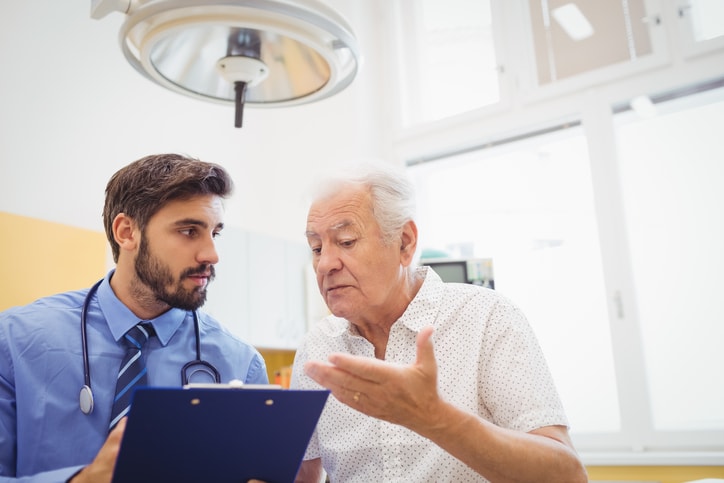 doctor with elderly patient